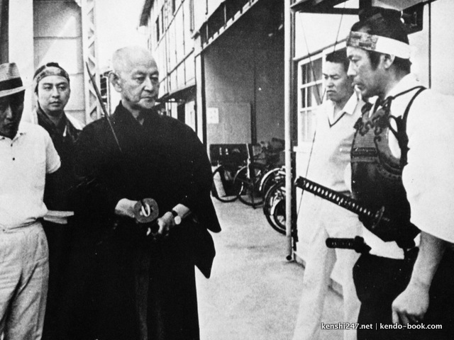 Takano Hiromasa (left) advising Mifune Toshiro on swordplay on set